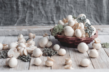 white mushrooms on a wooden table