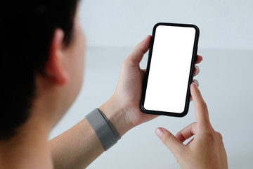 Mockup smartphone montage mobile application on a man hands with clipping path.