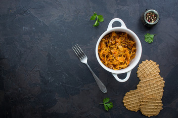 cabbage stew, lentils, spices, vegetables (braised cabbage). vegetarian food.  top view. copy space