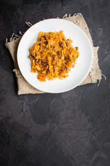 cabbage stew, lentils, spices, vegetables (braised cabbage). vegetarian food.  top view. copy space