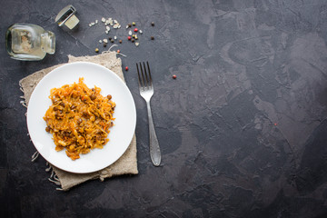 cabbage stew, lentils, spices, vegetables (braised cabbage). vegetarian food.  top view. copy space