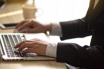 Hand typing on computer keyboard.On line business and business ideas