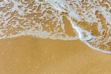 pure sands and clear sea water at the beach in summer 