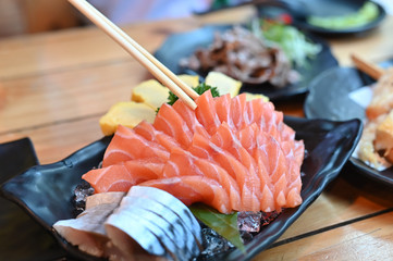 Raw salmon slice or salmon sashimi ok plate in Japanese style.