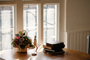 A Books on wood table with vintage tone.