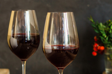 wine, red wine, transparent glass on a wooden table, a gift. Top view. copy space