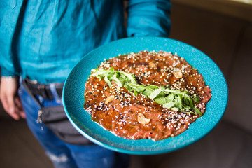Carpaccio with arugula