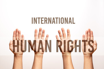 International Human Rights Day concept, raise hand up