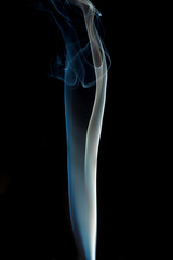 Obraz premium Blue smoke isolated on black background