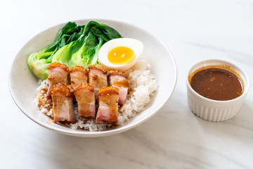 crispy pork belly on topped rice