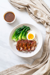 roast barbecue red pork on topped rice