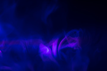 purple, blue, pink smoke (evaporation) on a black background