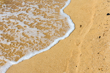 sea waves and pure sands at the beach