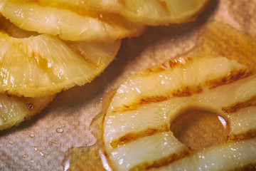 Grilled pineapple slices with  of honey