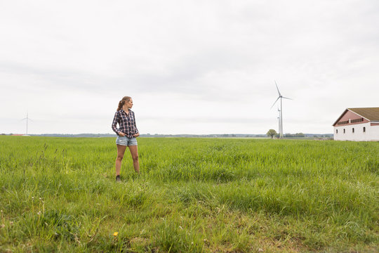 Agricultural worker standing in a field