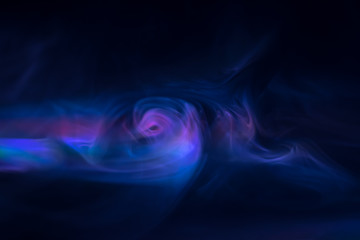purple, blue, pink smoke (evaporation) on a black background