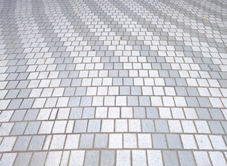 Brick or tile in pattern on the street