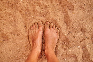 feet in sand