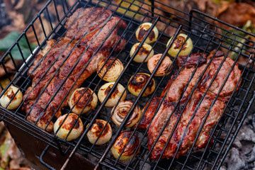 Pork meat cooking on the grill