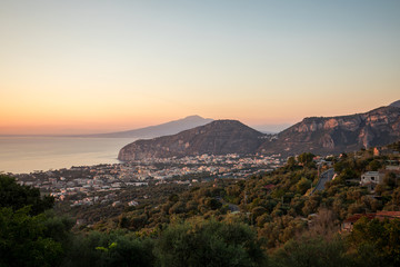 Romantic sunset in the Gulf of Naples and Vesuvius. Sorrento. Italy