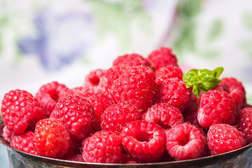 Fresh  raspberries in vintage basket, vitamins, healthy food, ve