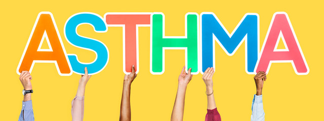Diverse hands holding the word asthma