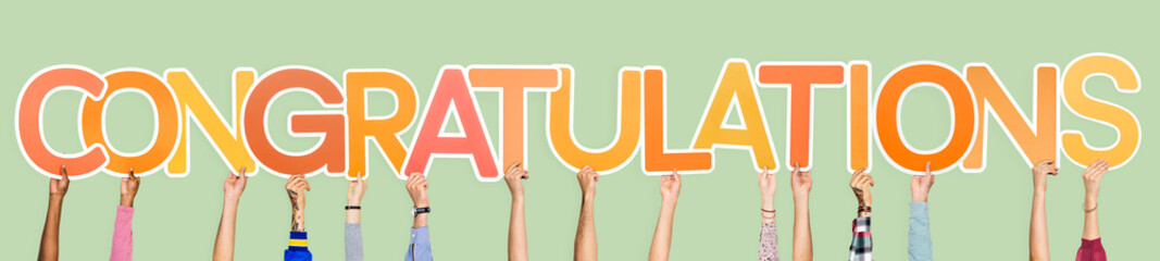 Hands holding the word Congratulations