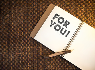For you written on a notebook