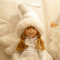 Festive Christmas decoration with a wooden and fabric doll