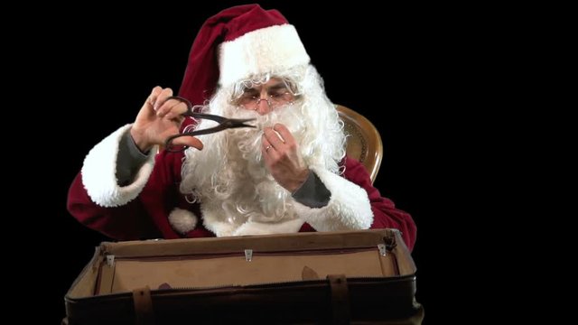 Santa Claus is looking for gifts and finds old scissors, vintage airplane and old film camera  MF
