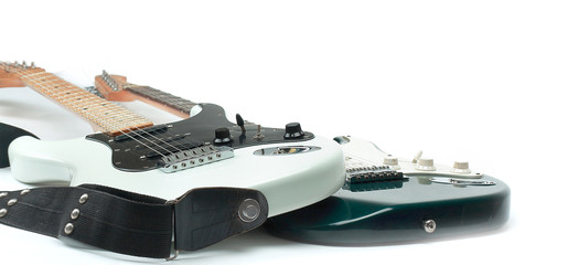 in the foreground .the fretboard of an acoustic guitar. isolate