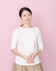 Asian female on pink background