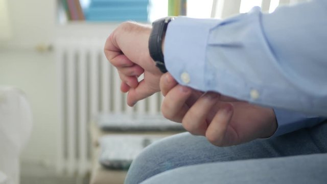 Restless Businessman Make Nervous Gestures and Look to His Hand Watch Check Time