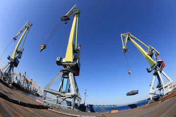 Fisheye view of the gantry cranes in the sea port