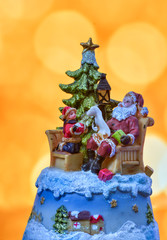 Christmas vintage toy decoration against golden bokeh background