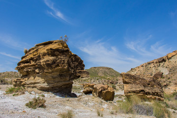 Fototapeta na wymiar stones and mountains in the desert, rocks in the desert of almeria, region of andalucia, spain