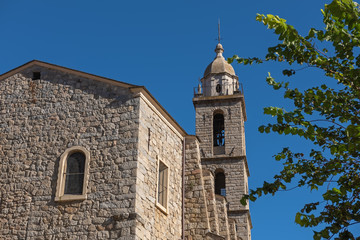 The top of the famous Sainte Marie church in Sartene, Corsica, France