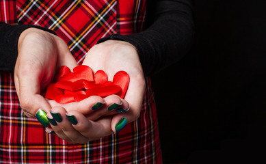 little red hearts in the hands