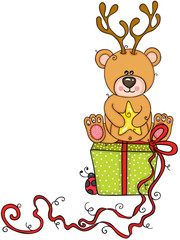 Teddy bear with with deer horns sitting on the green gift