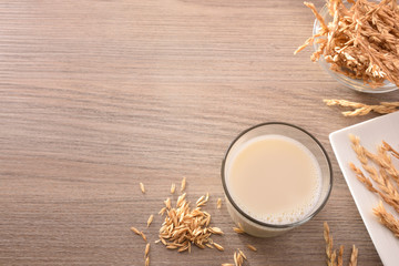 Spelled drink on wood table top view