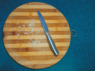 Crumbs of bread on the wooden desk