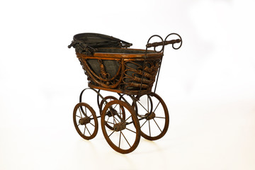 Fototapeta na wymiar Old-fashioned stroller isolated.