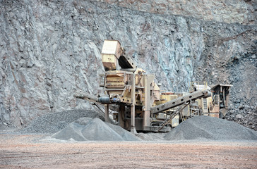 stone crusher in a quarry mine of porphyry rocks.