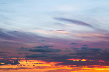 Beautiful soft dramatic sunrise orange pink blue sky with clouds