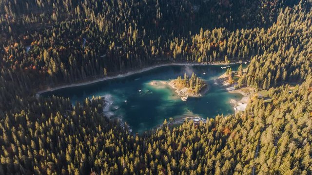 Aerial footage from the beautiful Lake Cauma surrounded by the mountains, located in Flims, Switzerland. Filmed during the sunrise with the DJI Inspire 2 drone in 5.2k RAW and downscaled to 4k.