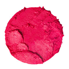 Smudged lipstick in a form of a circle isolated on white background