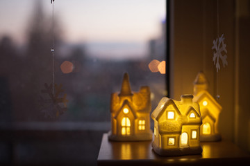 three ceramic lamp houses. Christmas decoration