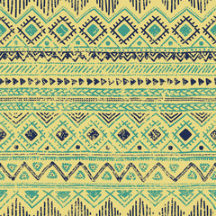 Seamless ethnic pattern. Tribal ornament. Striped geometric background drawing by hand. Vector illustration.