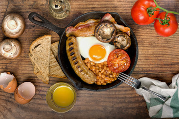 Classic English breakfast served. Close view.