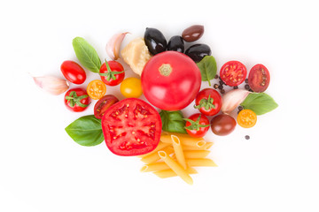  Fresh ingredients for simple pasta recipe with tomatoes and olives.